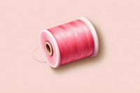 Thread roll pink red material. 