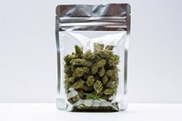 Cannabis plant jar white background. AI generated Image by rawpixel.