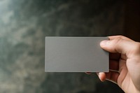 Hand business card aluminium holding. 