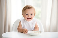 Baby portrait eating white. 