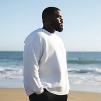 Outdoors beach looking sweater. 