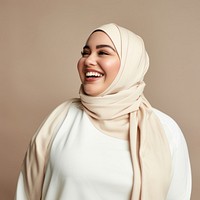 Laughing hijab smile studio shot. 