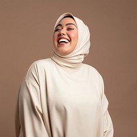 Laughing adult smile hijab. 