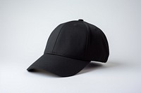 Black cap white background headwear. 