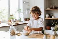 Kitchen cooking child happiness. 