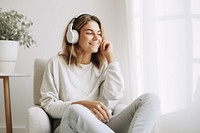 Headphones sitting headset smiling. 