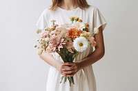 Flower holding daisy plant. AI generated Image by rawpixel.