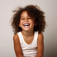Laughing female child smile. AI generated Image by rawpixel.