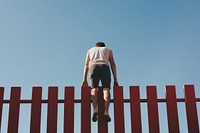 Outdoors adult fence man. AI generated Image by rawpixel.