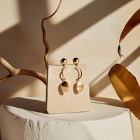 Earring jewelry accessories handicraft. AI generated Image by rawpixel.