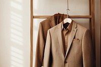 Blazer rack coat suit. AI generated Image by rawpixel.