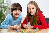 Child table game togetherness. AI generated Image by rawpixel.