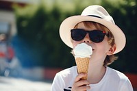 Sunglasses eating outdoors dessert. 