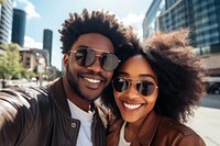 Selfie sunglasses laughing portrait. 