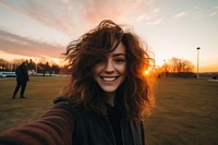 Portrait outdoors sunset selfie. 