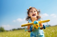 Toy airplane outdoors smiling. 