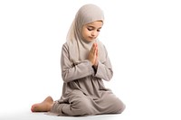 Praying sitting adult white background. AI generated Image by rawpixel.