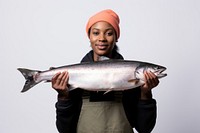 Fish holding animal white background. 