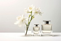 Perfume bottle cosmetics flower. AI generated Image by rawpixel.