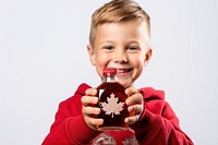 Maple syrup photography portrait holding. AI generated Image by rawpixel.