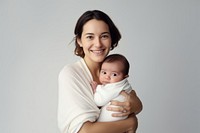 Baby carrying portrait newborn. AI generated Image by rawpixel.