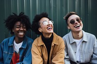 3 women laughing outdoors