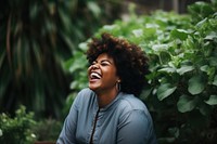 Laughing adult plant woman. 