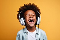 Headphones listening laughing headset. AI generated Image by rawpixel.