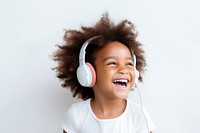 Headphones listening laughing smile. AI generated Image by rawpixel.