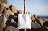 Bag outdoors handbag white. AI generated Image by rawpixel.