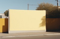 Architecture yellow wall advertisement. 