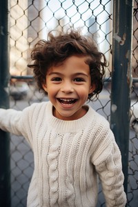 Sweater child portrait smile. 