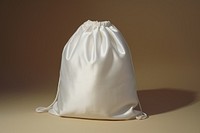 White bag textile handbag. 