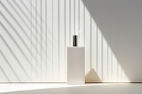 Perfume architecture shadow white.