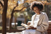 Sitting reading bench adult. 