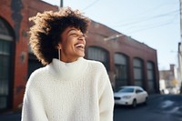 Laughing sweater winter smile. 