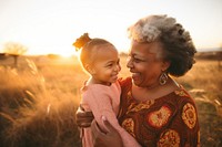 Grandmother grandchild portrait sunset. 