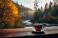 Autumn coffee cup outdoors. 