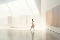 Defocused Woman Walking In Exhibition Art Hall walking art architecture. AI generated Image by rawpixel.