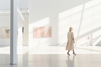 Defocused Woman Walking In Exhibition Art Hall walking adult woman. 