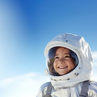 a photo of smiling girl child dressed as astronaut.  