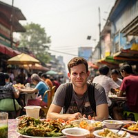 American man eating padthai food street adult. AI generated Image by rawpixel.
