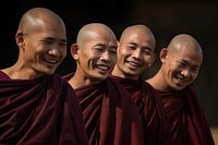 Buddhist monks smile laughing adult. 