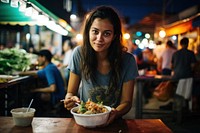 Hispanic woman eating padthai food adult meal. AI generated Image by rawpixel.