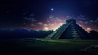 Photo of Chichen Itza skyline at night.  