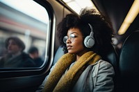 Woman wearing headphones headset train.