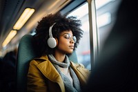 Woman wearing headphone headphones headset train. 