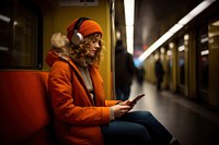 Subway headphones sitting vehicle. 