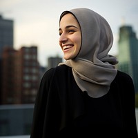 Muslim woman portrait smiling looking. 