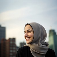 Muslim woman portrait smiling looking. 